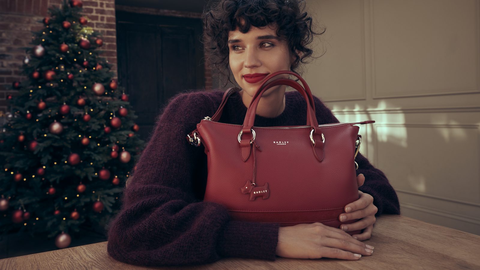 Extra 20% off gifting & all handbags £99 and under at Radley